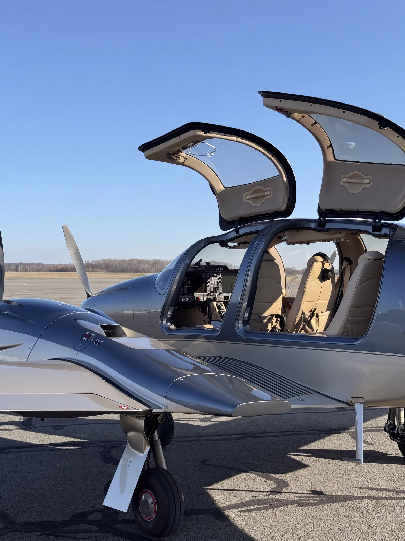 Our DA62 on the apron with its cabin doors raised, ready for boarding